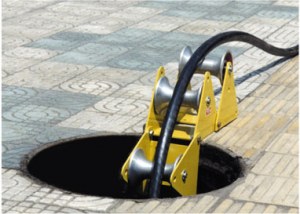 Manhole roller