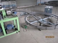 Continuous flexible hose forming machine