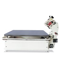 Mattress tape edge machine