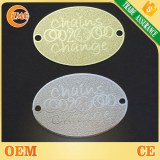 China factory directly wholesale cheap custom embossed oval brass logo tag