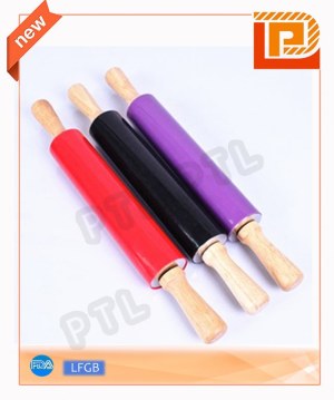 Wooden rolling pin with silicone wrapped in the middle