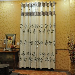 Embroidered curtain fabric