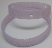 Debossed white colour filled with glitter silicone wristband